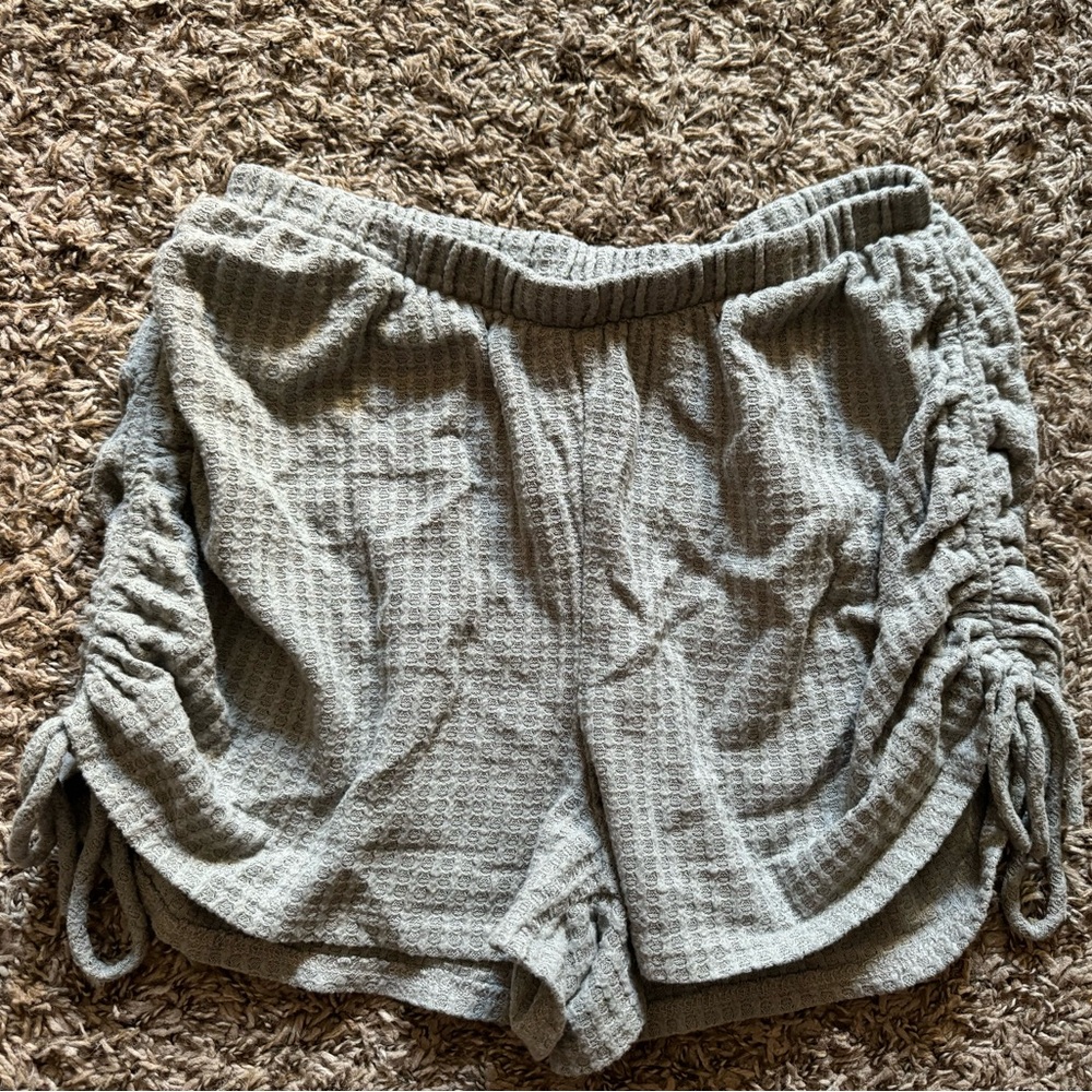 Cute gray shorts with detail on the side!